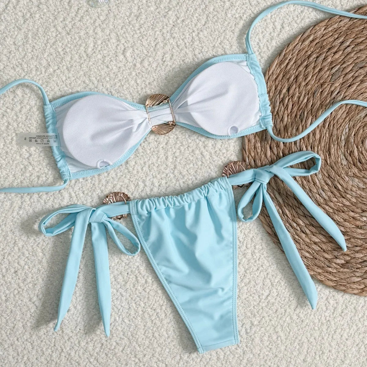 Blue women's high waist lace-up bikini swimsuit in polyester with metal shell detail on briefs