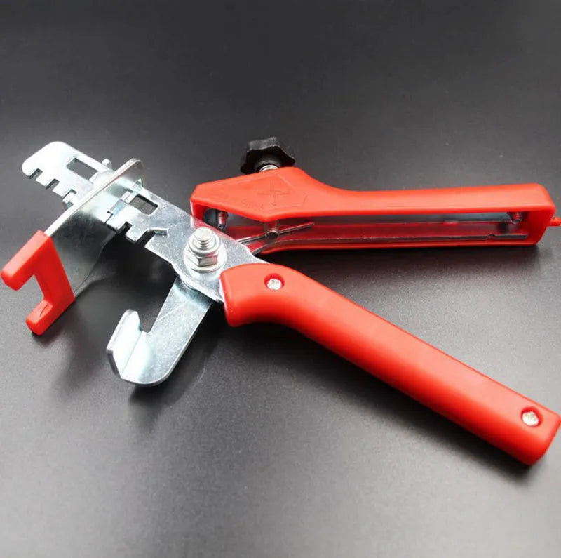 Red PVC and stainless steel tile leveling clip measuring 23 by 11.5 cm for floor tile installation