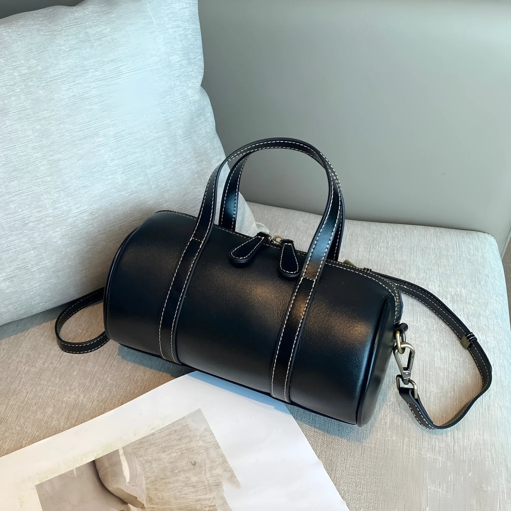 Cortex women's genuine leather crossbody bag in pillow shape with patchwork design, 24x12x13cm, available in black
