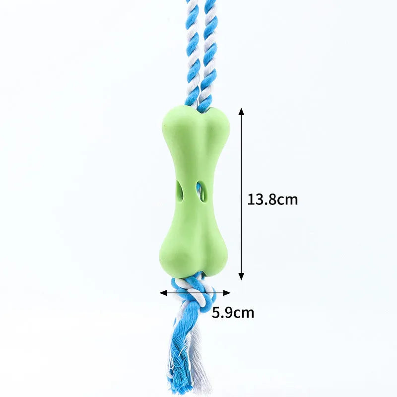 Green porous bone-shaped rope knot dog toy for chewing and holding treats.