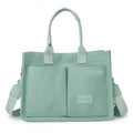 Large capacity canvas tote bag for women with multiple pockets and crossbody strap in creamy white