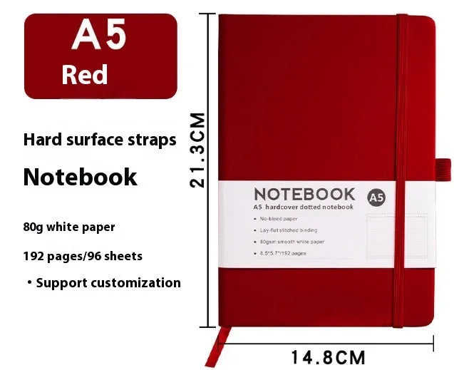 A5 size notebook with soft skin-feel PU leather cover and strap closure, open to show horizontal lined pages.