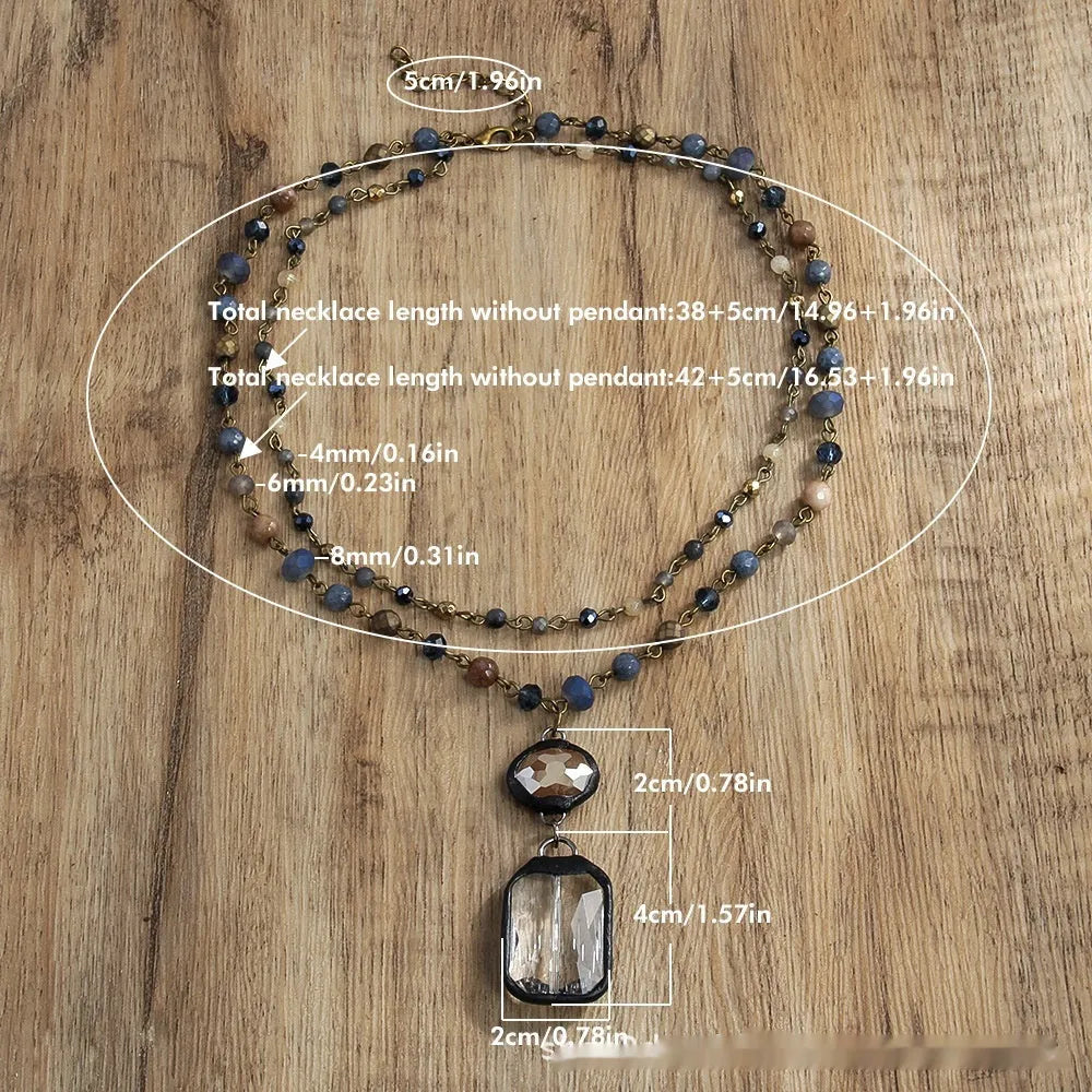 Two-layer tribal necklace with glass pendant and natural stone elements on adjustable chain