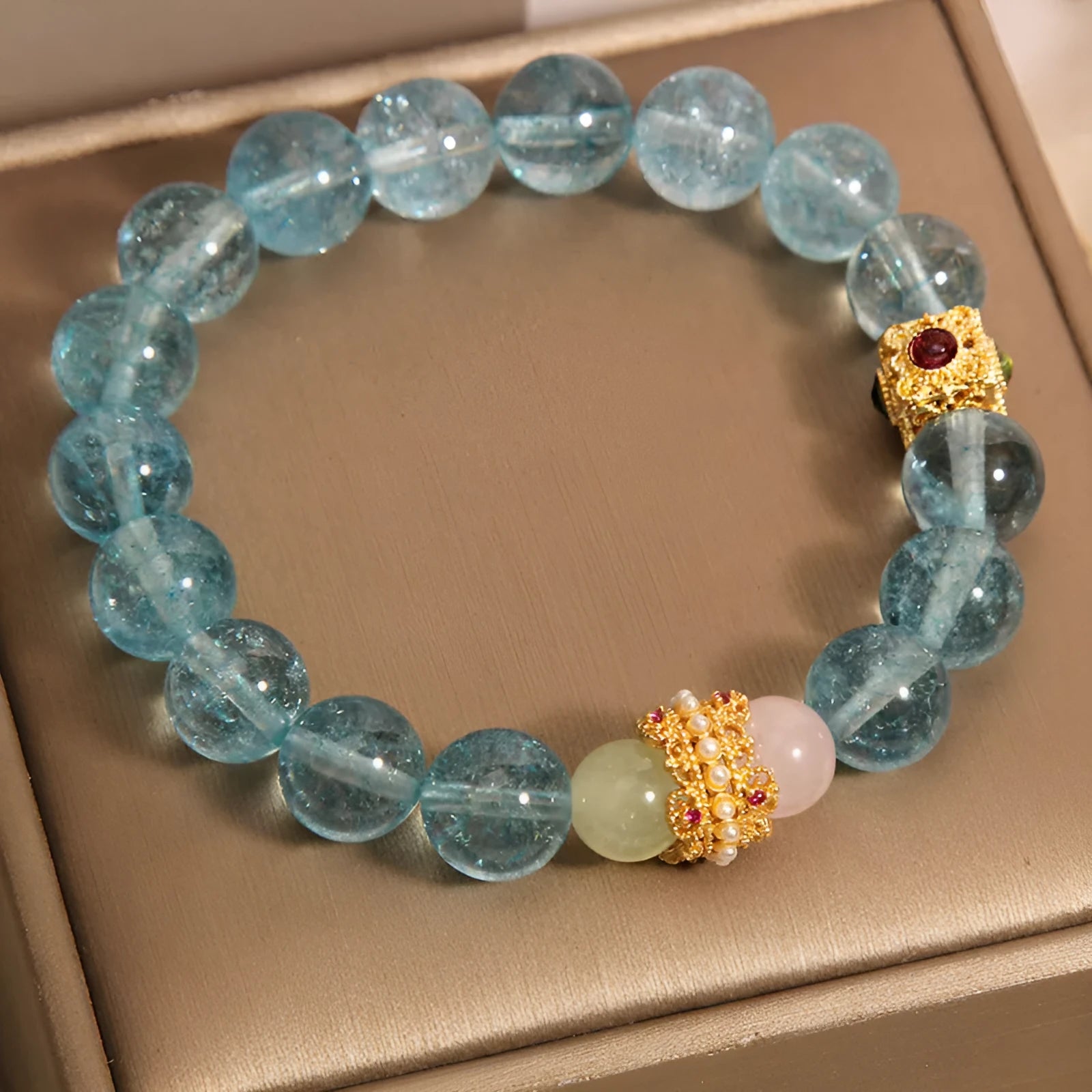 Women's Chinese style crystal bracelet with blue cube sugar beads and colourful stones on flexible ring