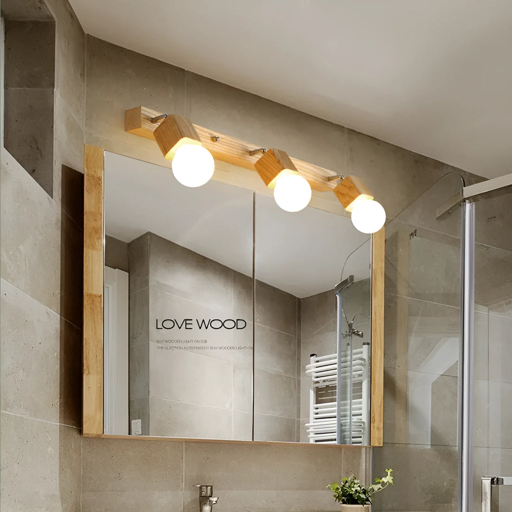 Compact 24cm LED wall lamp with a mirrored cabinet design mounted on a wall.