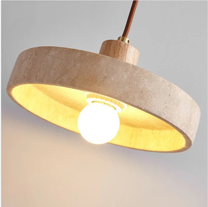 Small yellow cave stone and solid wood pendant light on a bedside table, 21 cm diameter, wood colour option