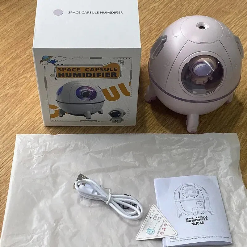 Astronaut-themed desktop USB humidifier with colourful LED light and 220ml water tank.