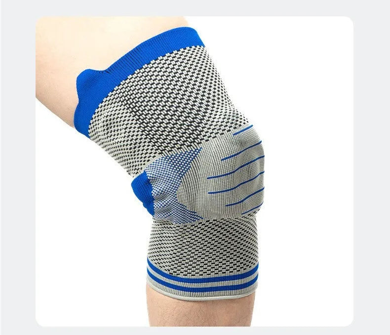 A single black and grey cotton knee pad featuring a central silicone shock absorber bar.