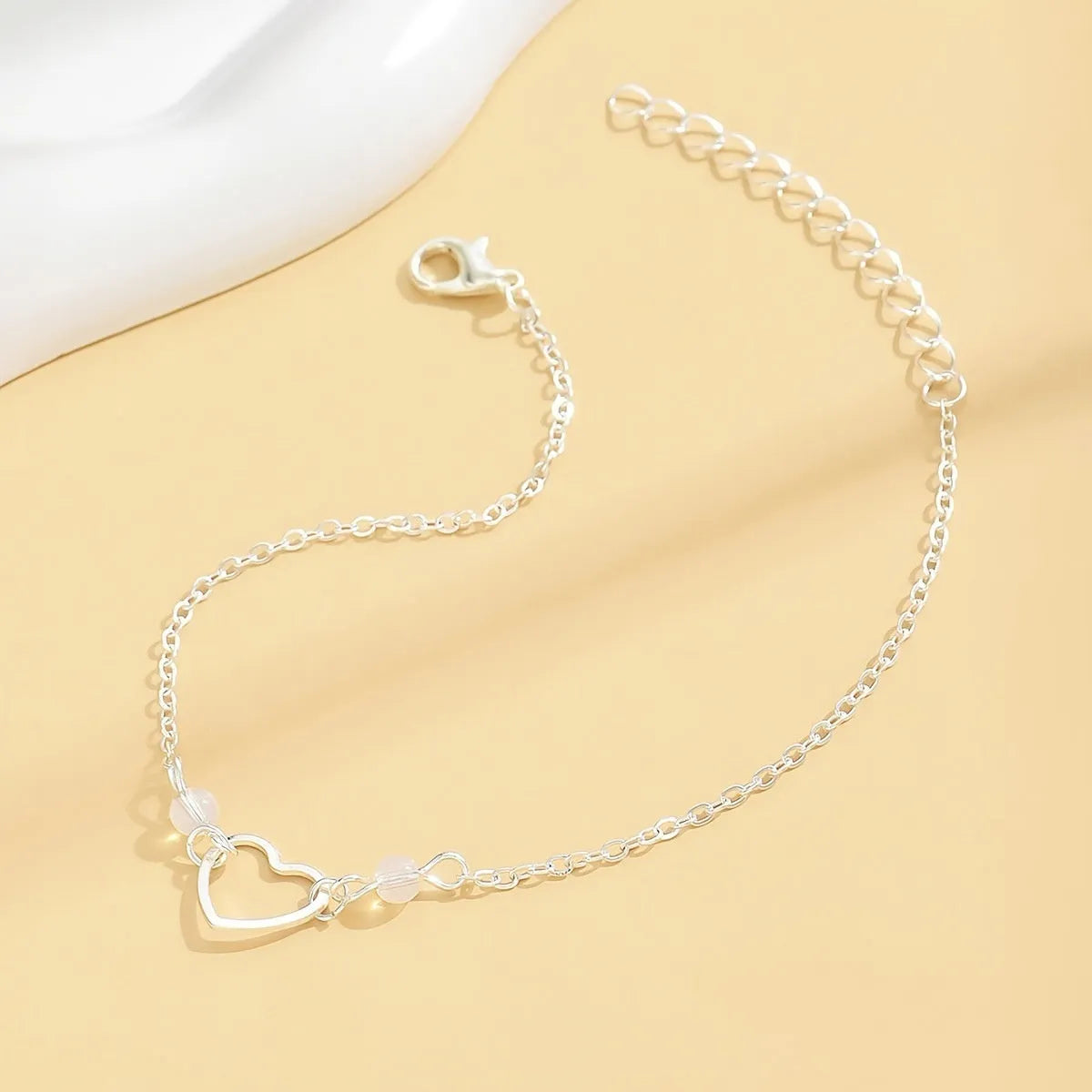 Women's adjustable heart pendant anklet in gold and silver alloy metal jewellery