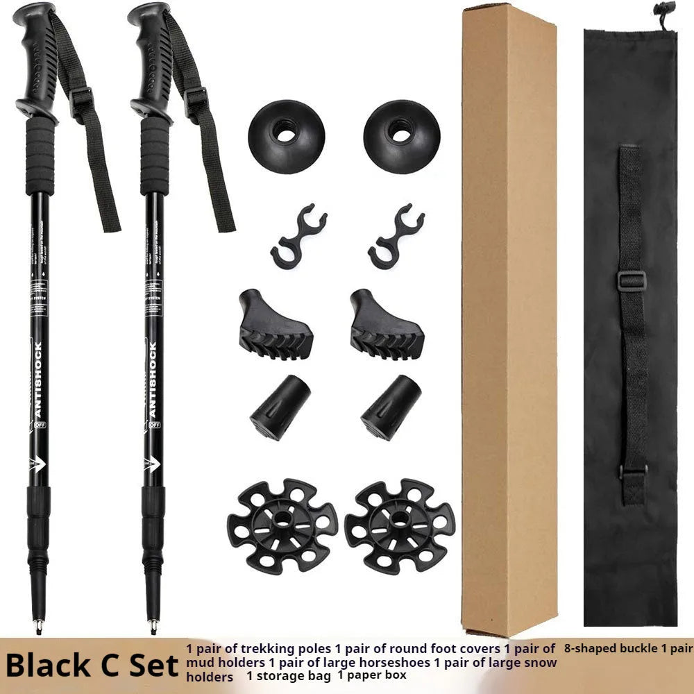 Aluminium alloy adjustable trekking pole extended to full length with mud support accessory attached
