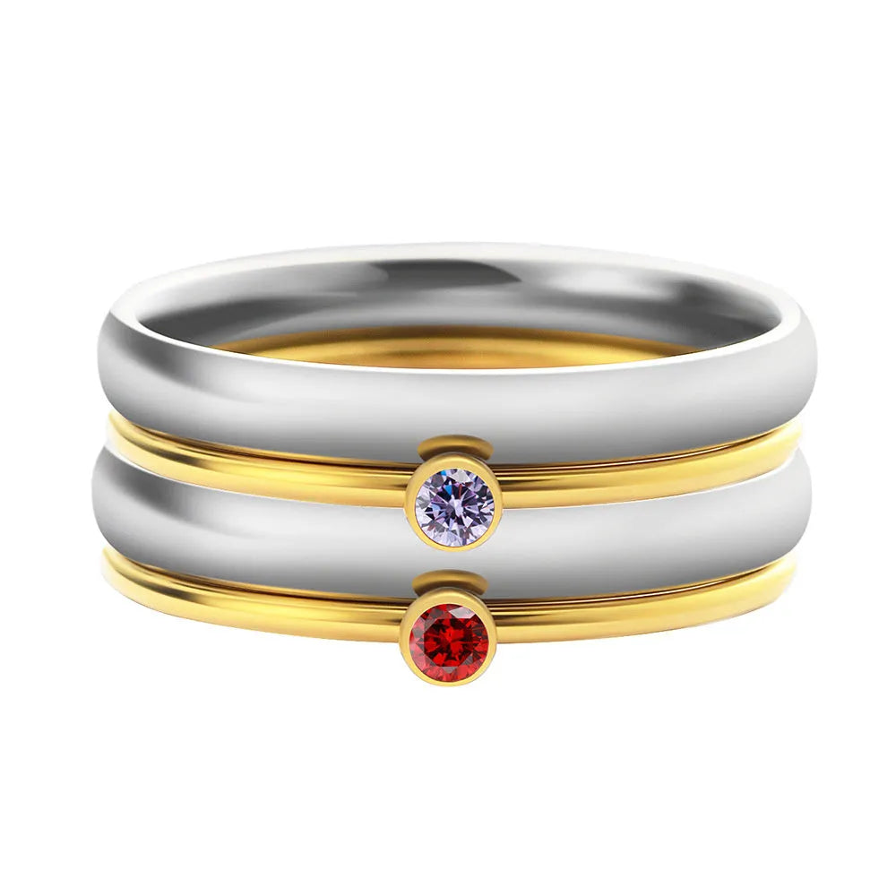December birthstone ring with engraved geometric pattern and gold electroplated finish on titanium steel band.