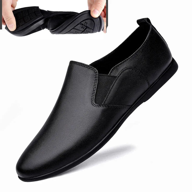 Men's black and brown cowhide leather shoes with round toes on a white background.