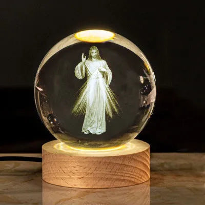 6cm white crystal ball desk ornament with laser-engraved cross design on a solid wood warm light base.