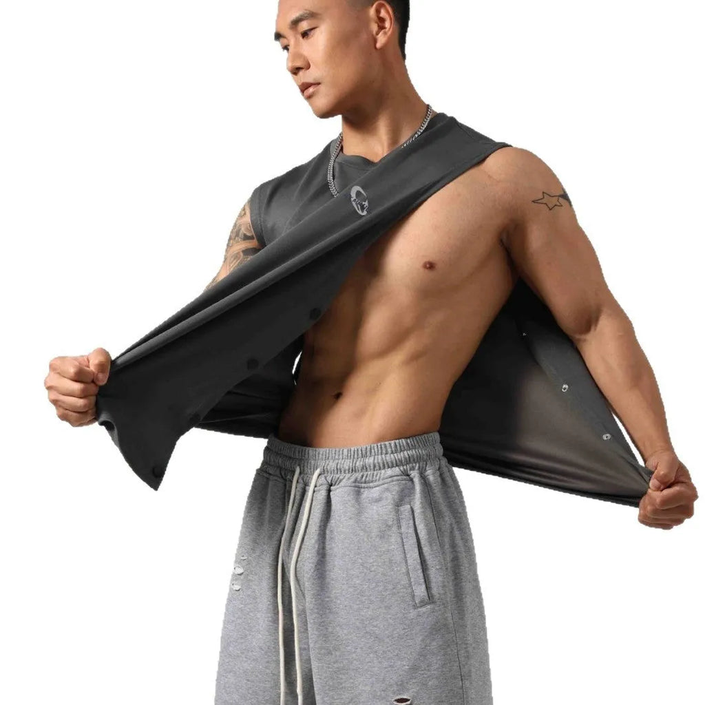 Male model wearing a solid colour loose fit cotton fitness vest with hidden side hooks.