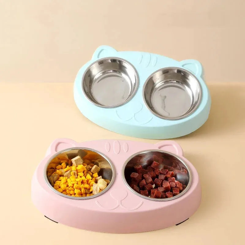 Blue double compartment plastic pet feeder tray for cat or dog food and water.