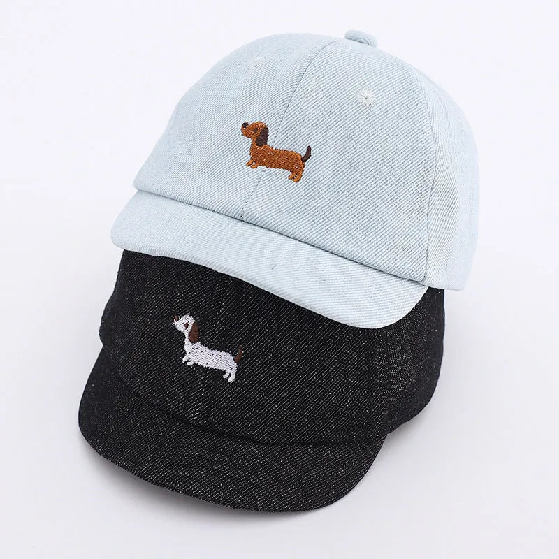 Denim puppy print baseball cap for babies with dome crown and short brim in black, dark blue, or light blue