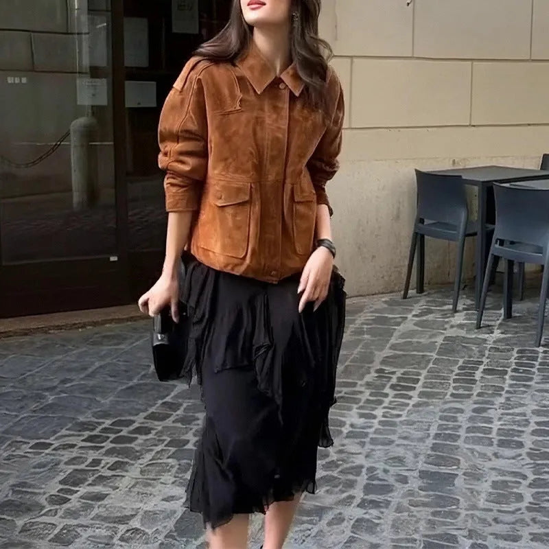 Brown suede-look polyester women's coat with regular sleeves on a hanger.