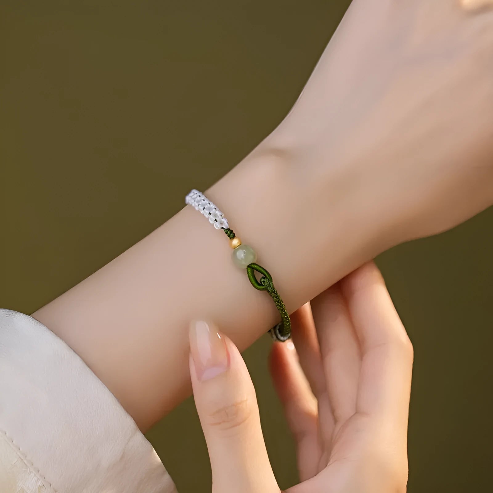 Sterling silver electroplated Hetian jade bracelet on adjustable cord strap