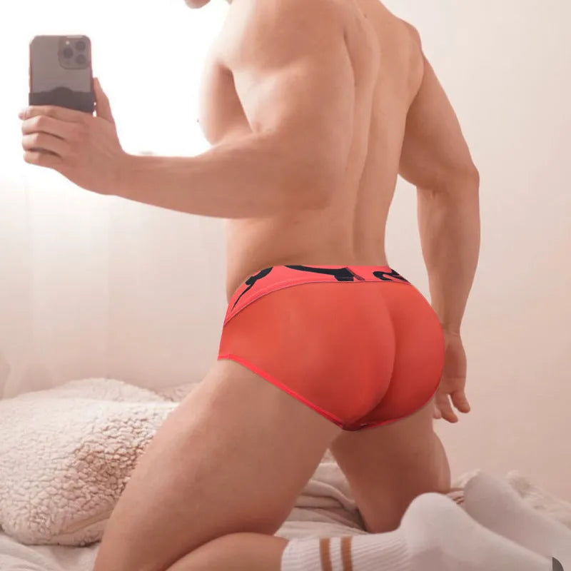 Men's solid colour cotton modal boxer shorts laid flat showing low-waist design