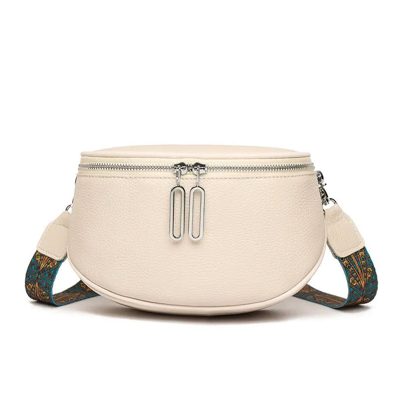 Women's soft PU leather messenger bag in saddle shape with cross-body strap