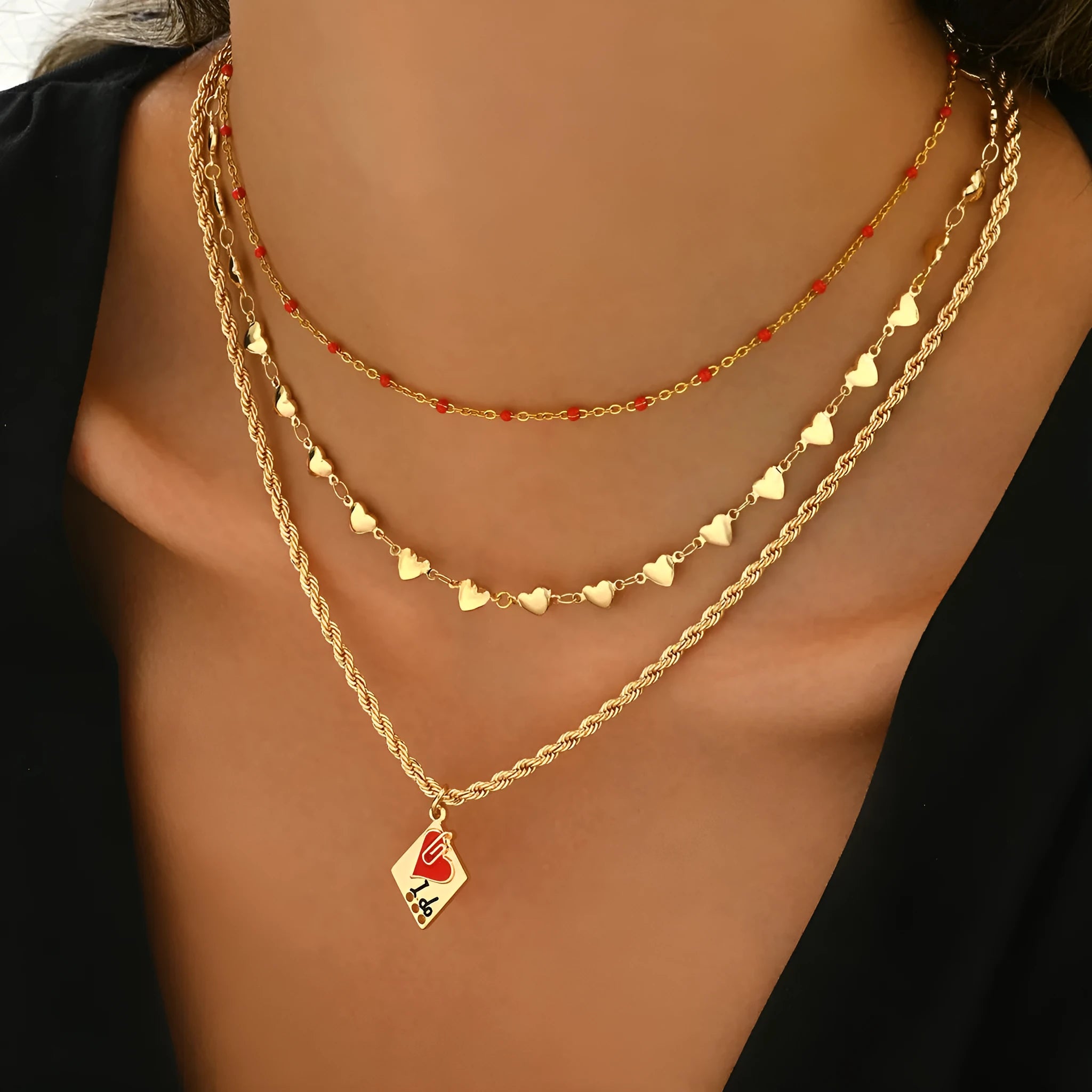 Three-layer clavicle necklace with geometric heart pendants on adjustable chain