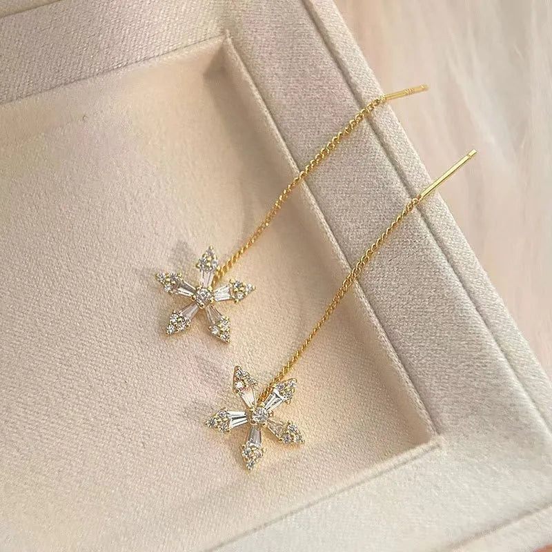 Long style gold dangle earrings for women with metal construction