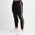 Sports cropped pants in polyester fibre, available in multiple colours including black red and khaki, sized L to XXL.