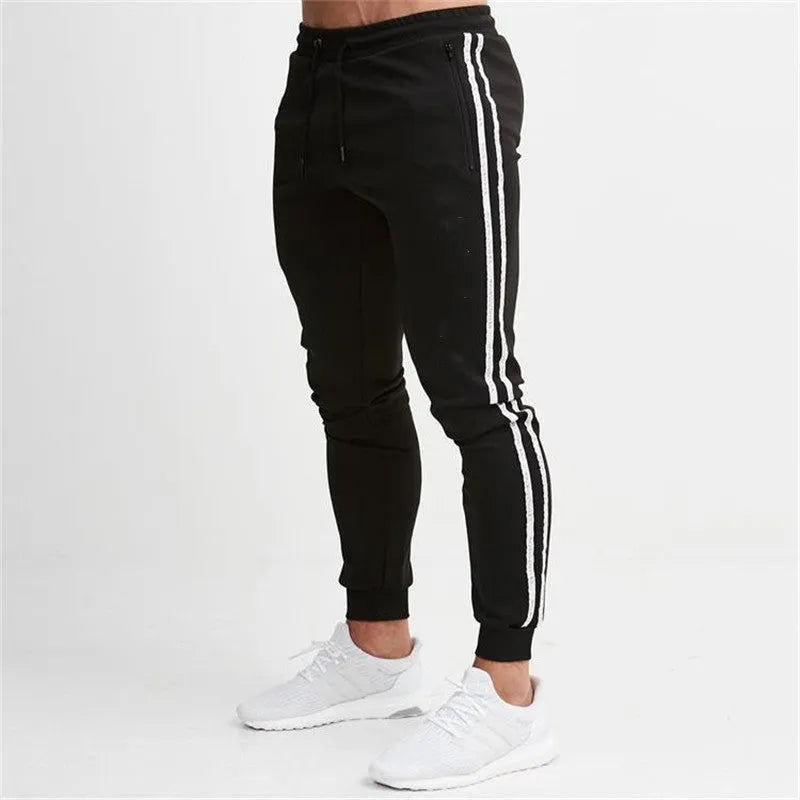 Sports cropped pants in polyester fibre, available in multiple colours including black red and khaki, sized L to XXL.