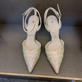Women's black hollow high heels with red sole and pointed toe stiletto design