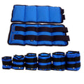 A pair of Oxford cloth legging sandbags for track and field training with weight options from 1kg to 6kg.