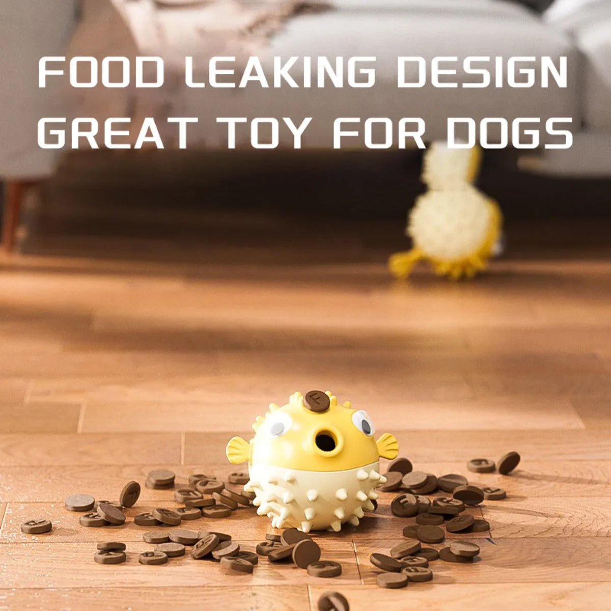 Yellow vinyl fish-shaped dog chew toy with textured surface and squeaker.