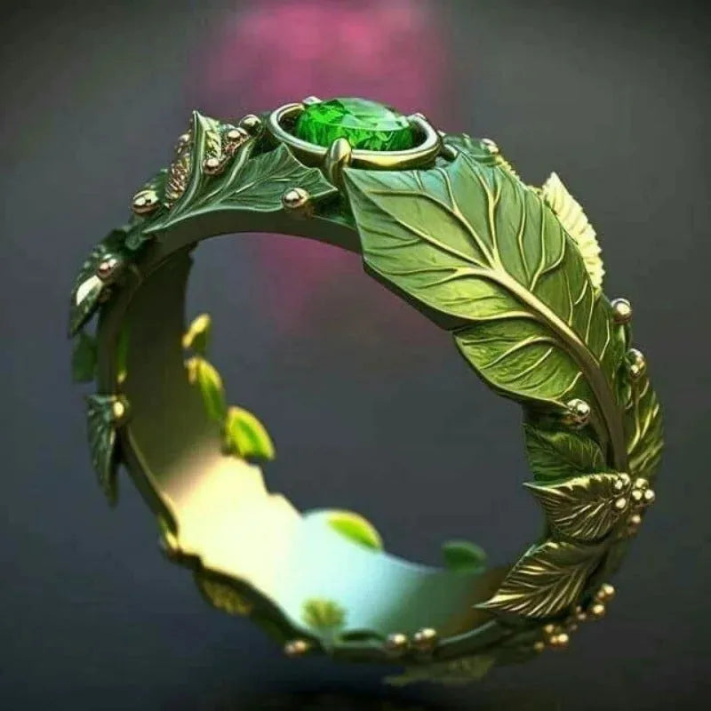 Gold antique style leaf ring with zircon inlay and enamel glaze on white background