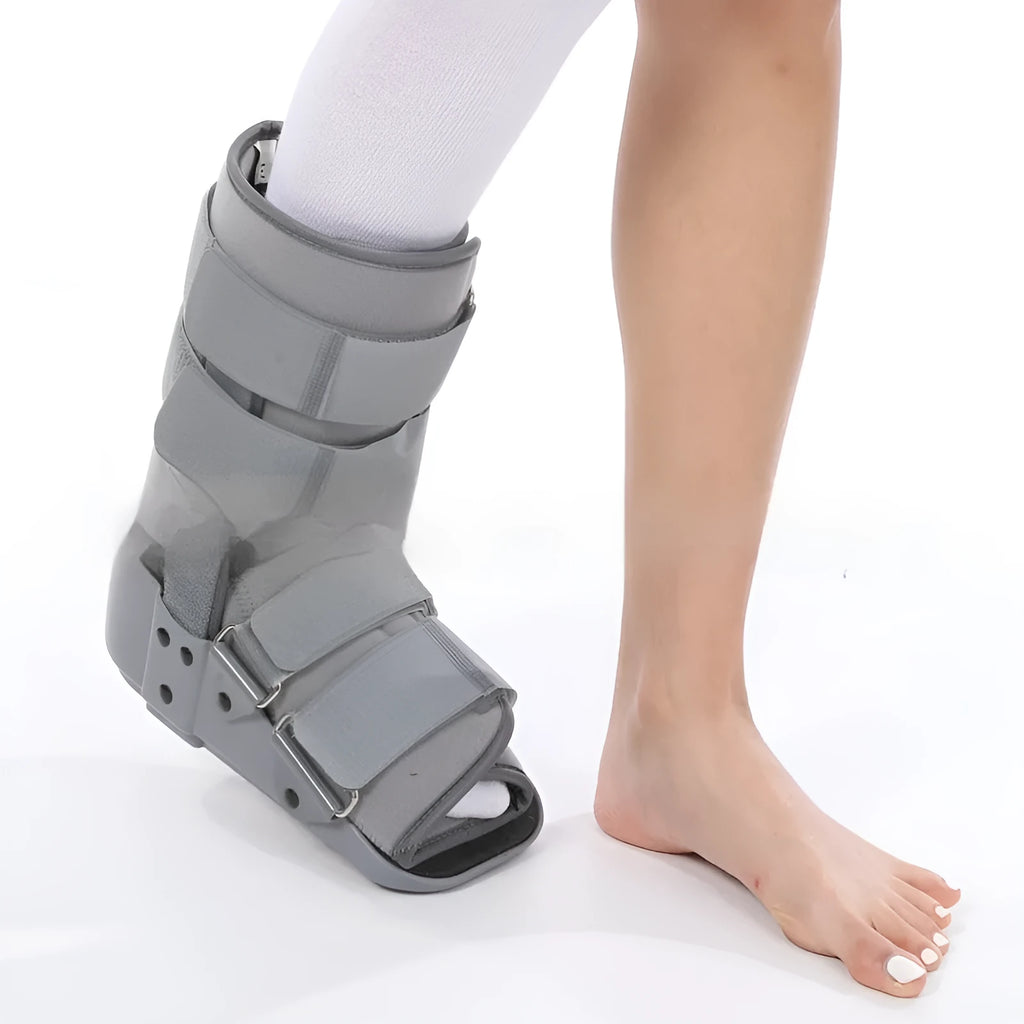 Achilles tendon rehabilitation boot in black or grey with adjustable straps and PP plastic construction