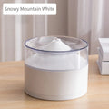 White ABS automatic cat drinking fountain on a flat surface with water in the bowl