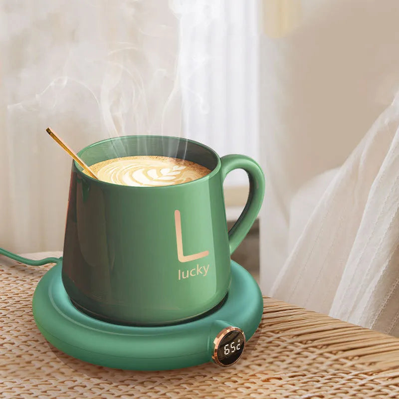 White USB-powered coffee mug warmer coaster on a wooden desk