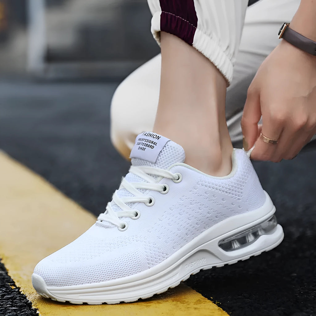 Casual Flyknit running shoes in multiple colours showing mesh upper and PU sole.