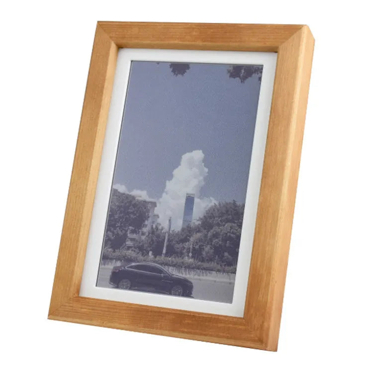 73-inch solid wood photo frame with rainbow colour band and e-ink screen displaying a still image