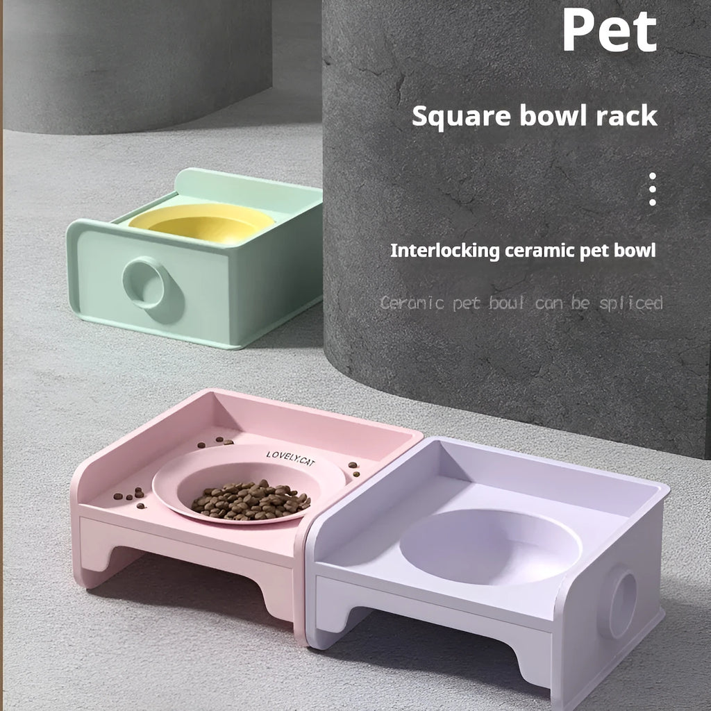 Ceramic UFO cat bowl in beige resting on square white rack, raising food height for whisker comfort