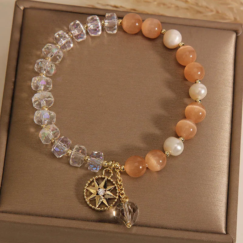 Orange women's bracelet with eight Awn star design featuring opal crystal and gold-plated inlaid artificial gemstones