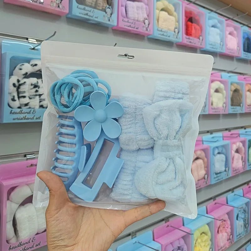 16 bow-shaped plaid washing face hair bands in multiple colours with a wrist strap on a white background