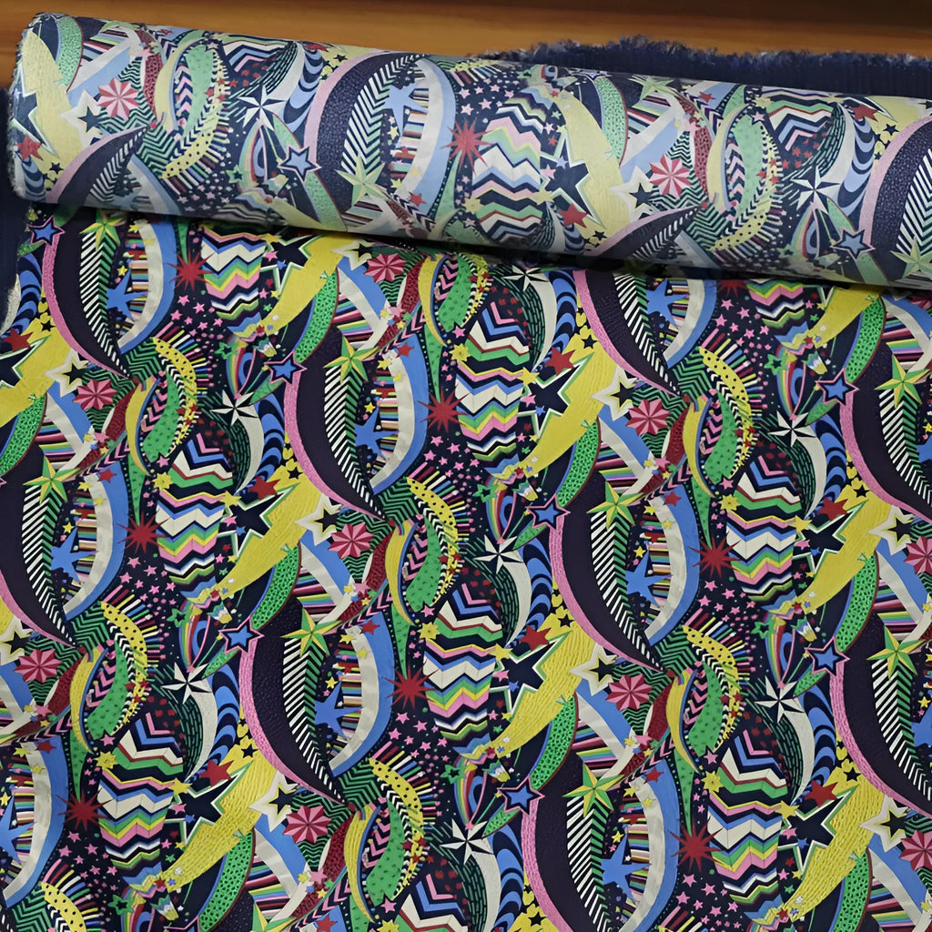 Blue plant and flower pattern on 100% cotton fabric, showing the 145 cm width.