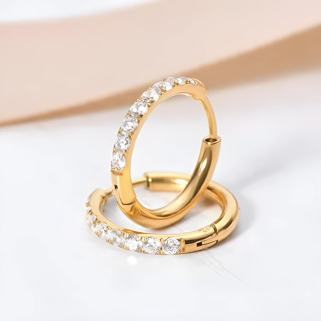 Gold diamond-studded stainless steel earrings on display showing post-back closure, available in 8mm 10mm and 12mm lengths