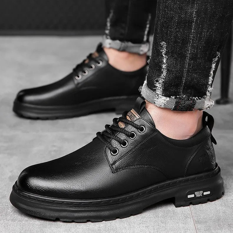 Men's black retro casual shoes with round toe, flat square heel, and decorative stitching on the PU upper.