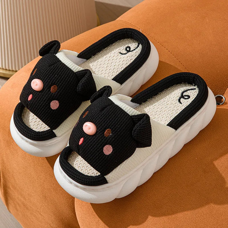 A pair of open-toe linen flip flop slippers for couples, shown in a choice of colours with a cushioned footbed.