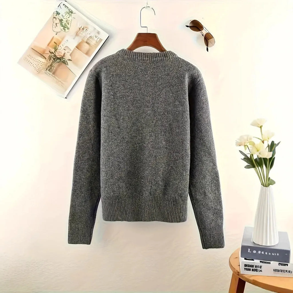 Women's dark grey button-front polyester cardigan sweater on a hanger.
