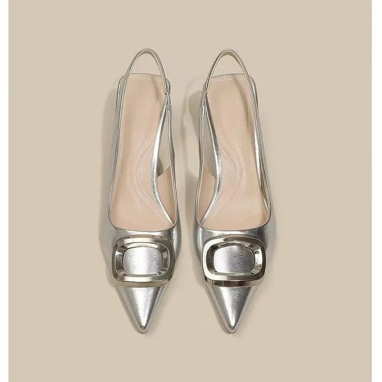Pointed toe classy high heels with French square buckle in black, cream white, and silver. Microfiber and rubber construction. Sizes 35 to 39.