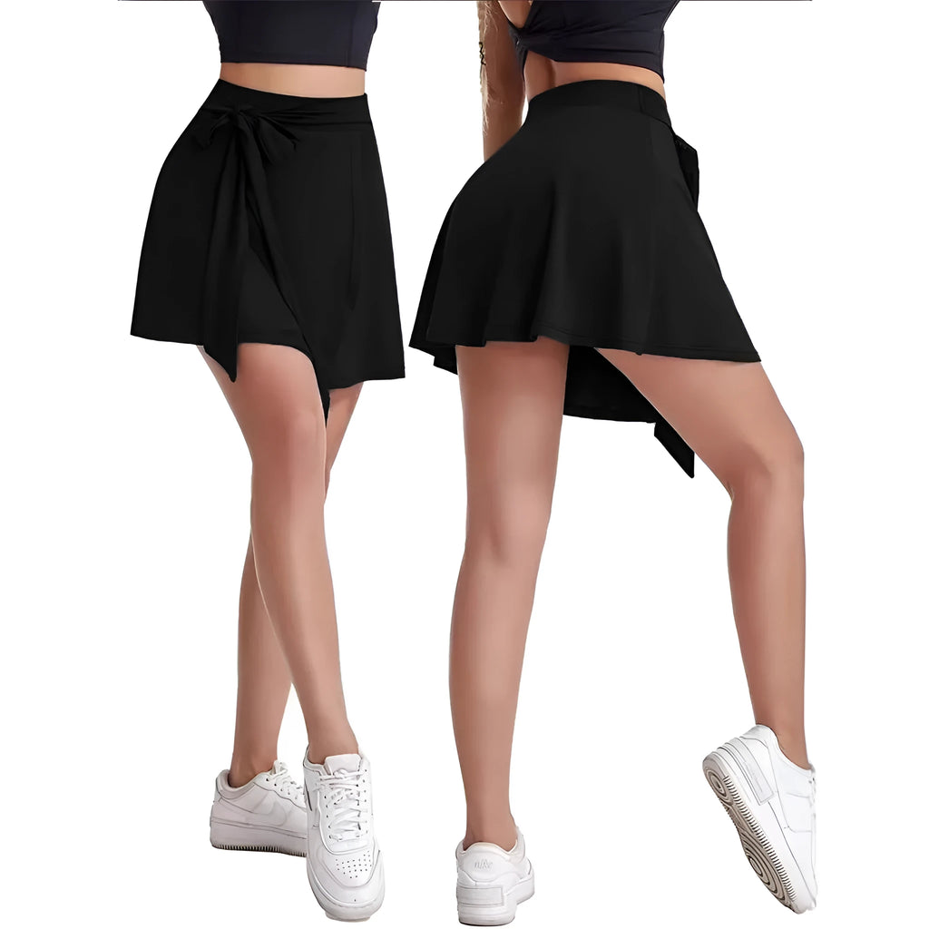 Black thigh-length sports culottes skirt with built-in shorts, high waist, and shoulder strap details
