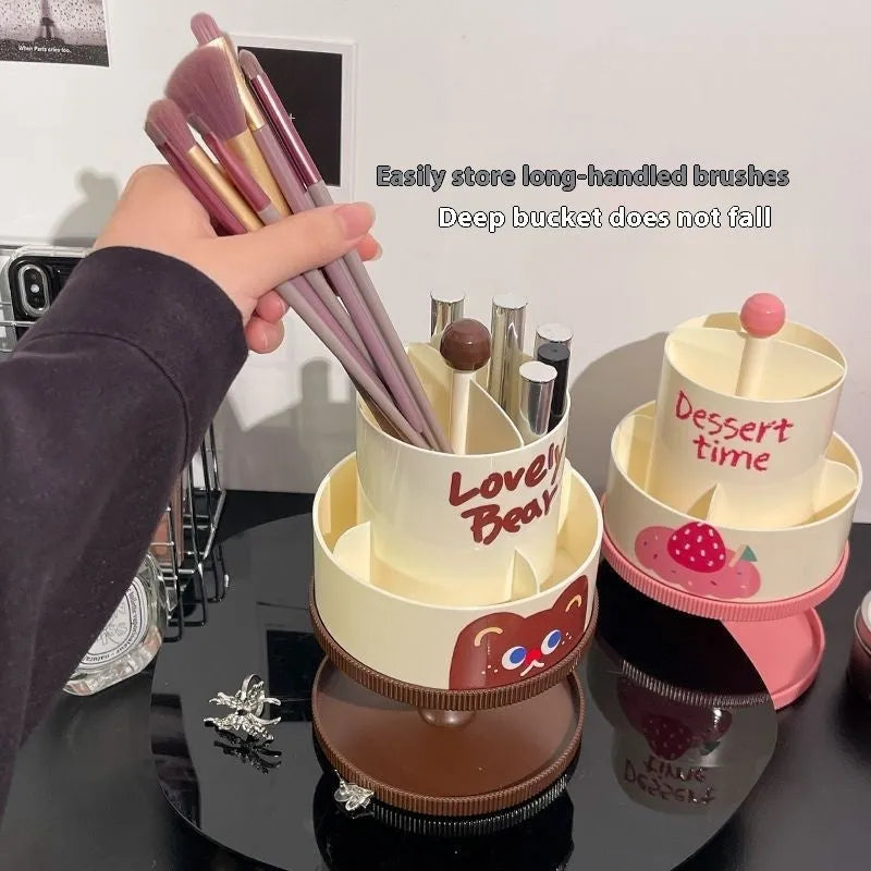 Rotating beige cosmetic brush storage barrel with 18-litre capacity on a table.