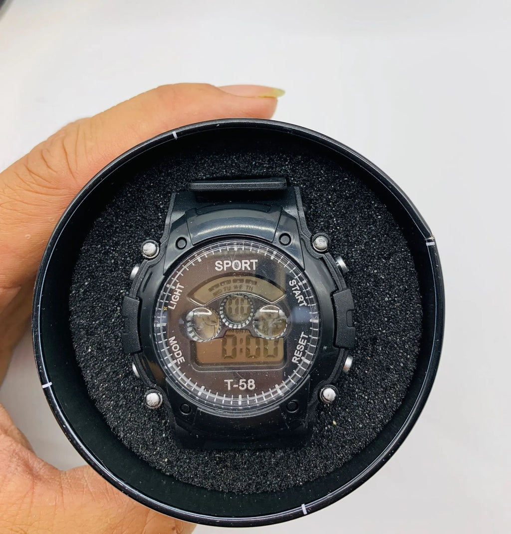 Children's digital sports watch with silicone strap and plastic case, showing digital display.