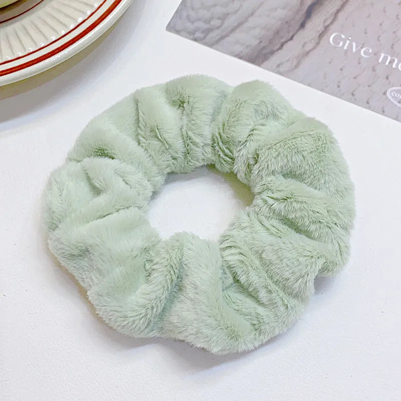 Fashion simple solid colour cloth hair ring for women in round ring loose style, available in 12 colours.